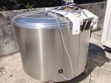 an image of a stainless steel tank sitting on top of a wooden pallet