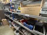 many boxes and bins on the shelves in the warehouse
