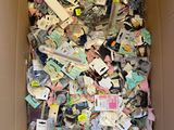 a cardboard box filled with lots of assorted items