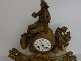 a clock that is sitting on top of a table