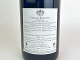 a bottle of wine that is sitting on a table