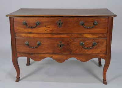an old wooden chest of drawers with metal handles and drawers