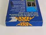 a blue box with a game on it sitting on a table