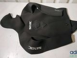 a close up of a wetsuit on a white surface