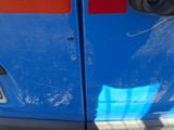 a close up of a car door with a number plate on it