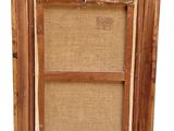 an old wooden picture frame with a picture of a bird on it