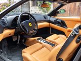 the interior of a yellow sports car is clean and ready to be driven