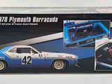 a box with a picture of a blue and white race car