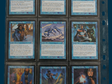 a lot of cards that are in a binder