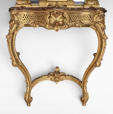 an image of a table with a clock on top of it