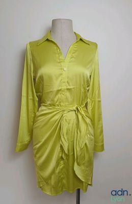 lime green shirt dress on a mannequin stand