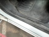 a close up of the inside of a car ' s trunk