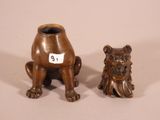 pair of bronze figurines of a dog and a bear