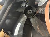 a fan that is sitting on top of a table
