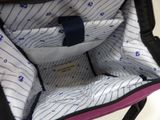 a close up of the inside of a suitcase
