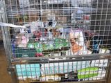 a metal cart with many items in it in a warehouse