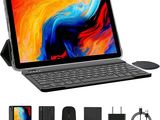 an image of a laptop with a keyboard and mouse next to it