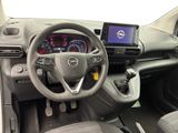 the interior of a car with a steering wheel, dashboard, and dash board