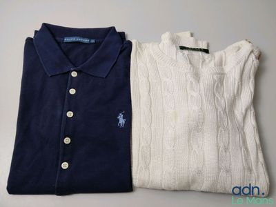 two polo shirts sitting next to each other on a table