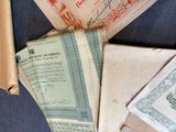 a pile of old papers that are sitting on a table