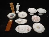 a lot of plates and bowls on the table