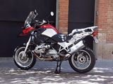 a motorcycle parked on the side of the street