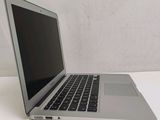 a laptop computer that is sitting on a table