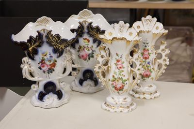 three vases that are sitting on a table