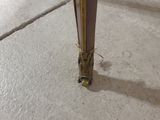 a close up view of the legs of a chair