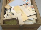 a box full of mail sitting on top of a table