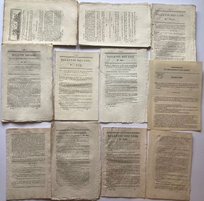 several pages of old books are stacked on top of each other