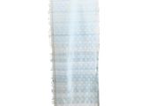 an image of a blue and white rug hanging on a wall