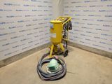 a machine that is sitting in the corner of a room