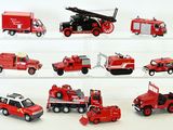 many different types of toy fire trucks on display