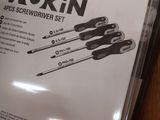 a package of screwdrivers on display in a store