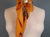 an image of a mannequin with a scarf on it ' s neck