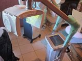 an image of a room with a computer and a chair