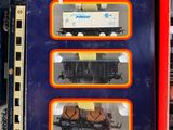 a box with a train set in it on a table