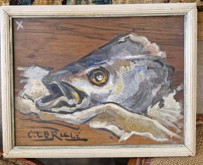 un tableau représentant un poisson posé sur une table