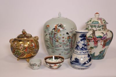 many vases and bowls sitting on a white surface