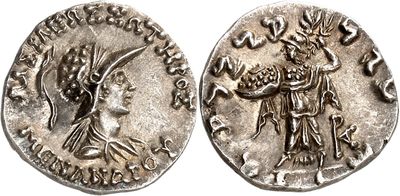 a silver coin with an image of a woman and a man on it