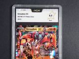 a close up of a pokemon trading card on a table
