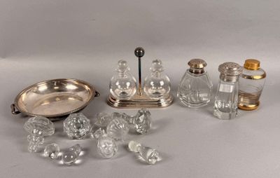 a lot of silver and glass items on the table