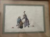 framed picture of a woman and a child playing with a dog