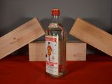 a bottle of alcohol that is sitting on a table
