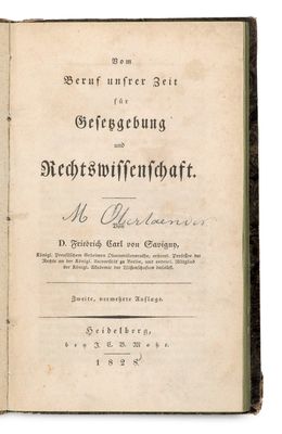 an old book with a black and white title on it