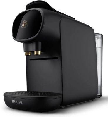 une machine à café noire posée sur un plan de travail blanc