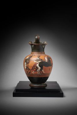 an image of a vase with a horse and rider on it