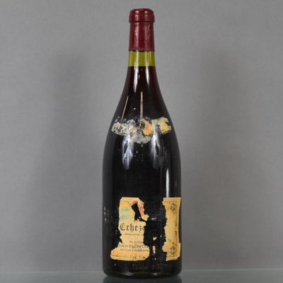 a bottle of wine that is sitting on a table