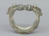 an image of a silver ring with two elephants on it